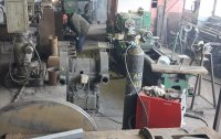 examination of pyrolysis machine parts prepared for loading