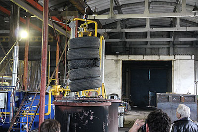 The Company Technokomplex. Loading of Scrap Tires into the Crucible for Pyrolysis
